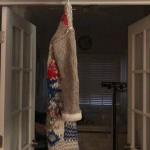 Cute Free People sweater.  Oatmeal,blue and red.